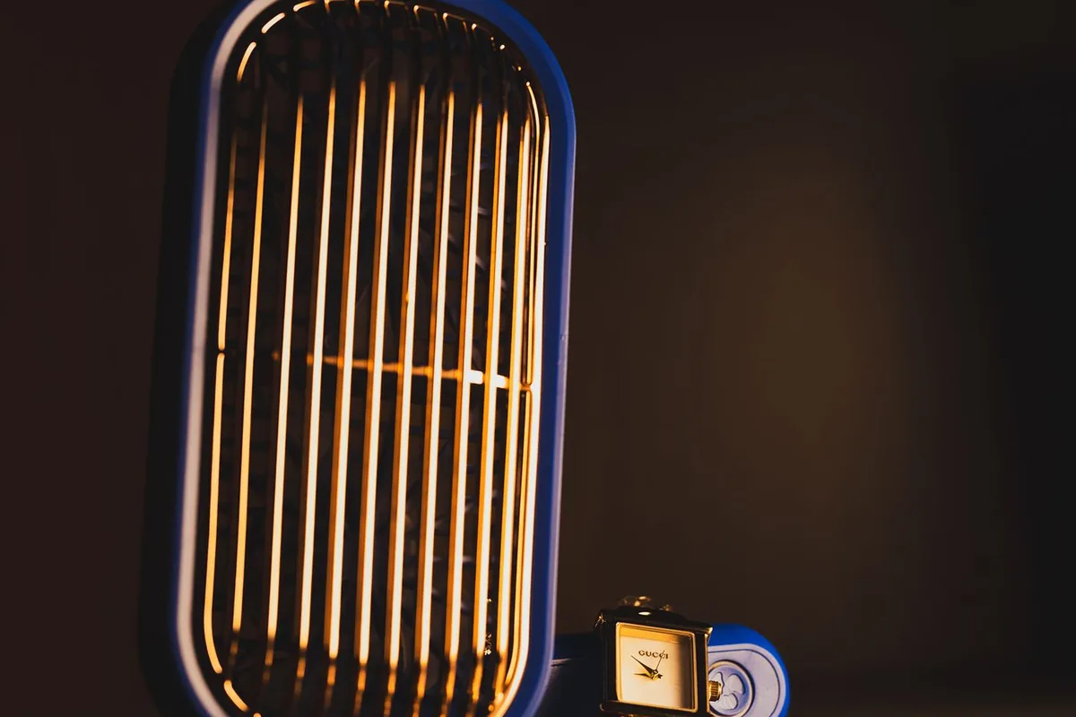 Portable cooling fan and home appliance placed indoors near a wall